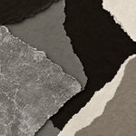 Abstrakte Collage gerissener Schichten in Schwarzbraun, Grau, Taupe und Gebrochenweiß mit Krakelee