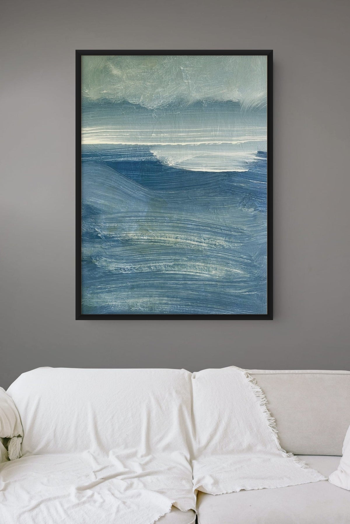 Schilderij met zwarte lijst aan de muur