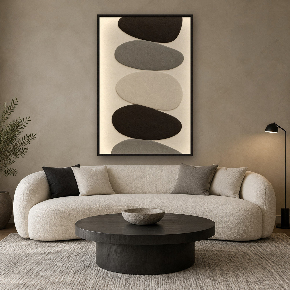 Pebble Stack in Balance wall art with black frame on the wall in the living room